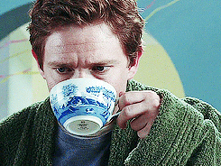 Martin Freeman as Douglas Adams's Arthur Dent, taking a sip of tea and saying 'oh, come on, that's lovely'