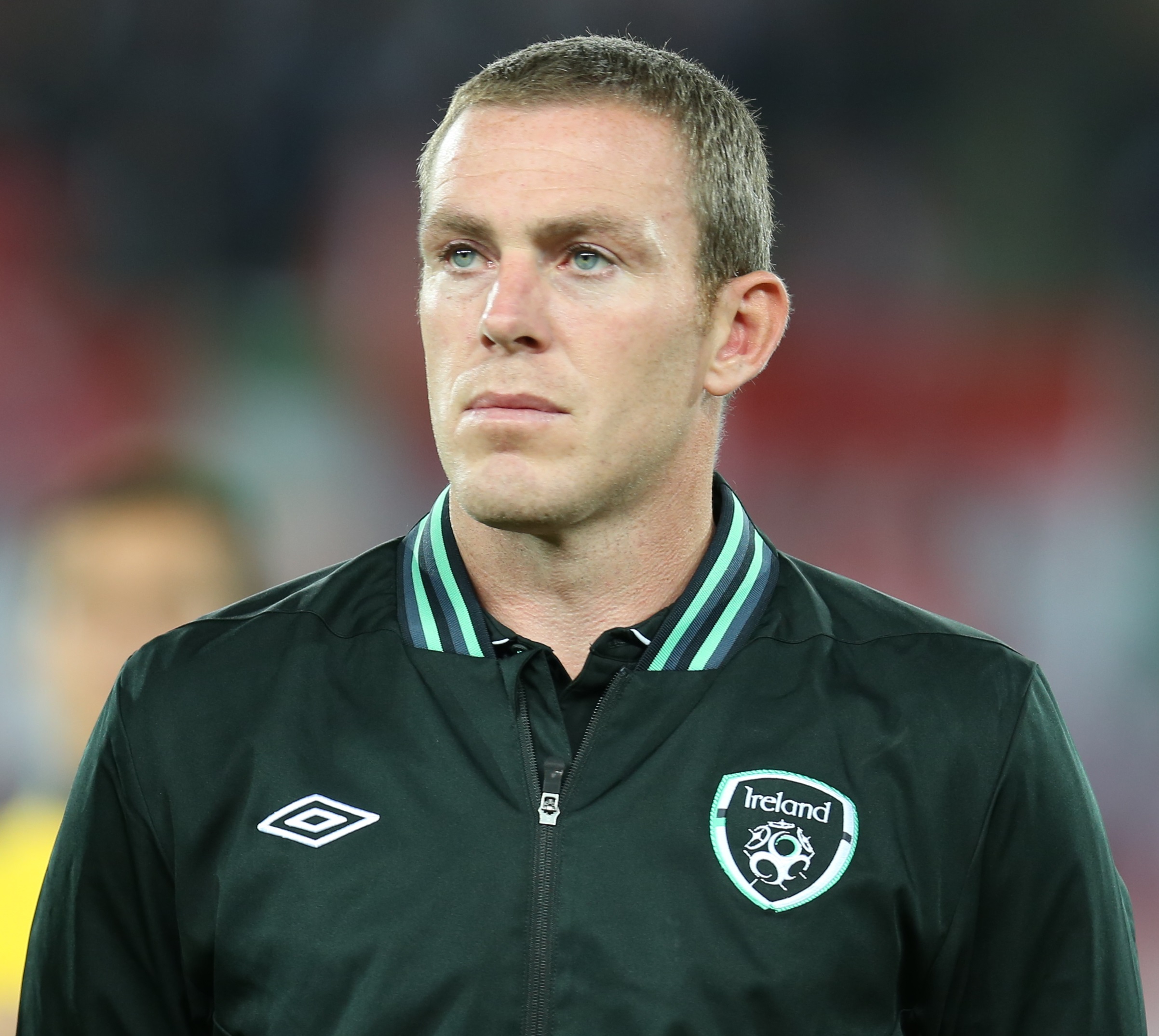 Profile picture of footballer Richard Dunne in an Ireland international jersey.