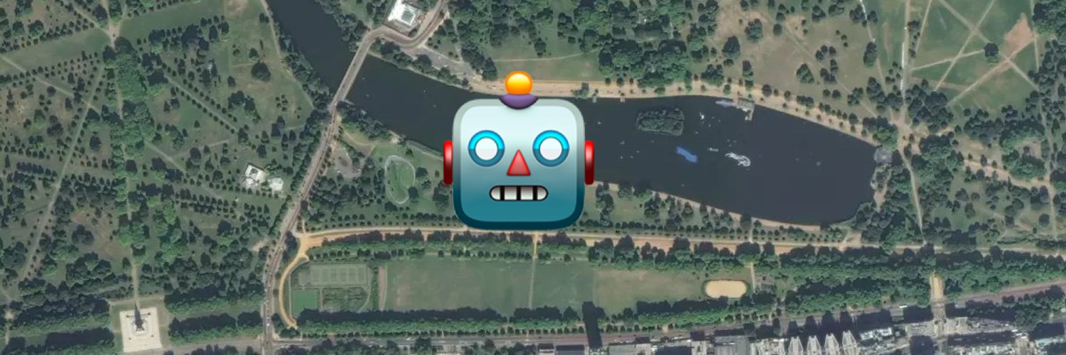 A satellite image of Hyde Park in London, with an emoji robot placed in the centre.