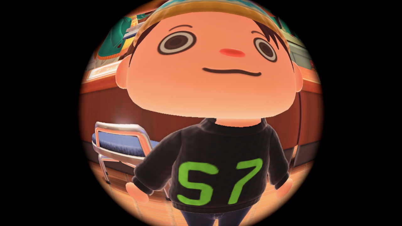 Fish-eye lens selfie of the player-character from the game Animal Crossing New Horizons. The character is wearing a knitted black hoodie with bright green letters that say 'S7'. The picture is taken in the Resident Services building.